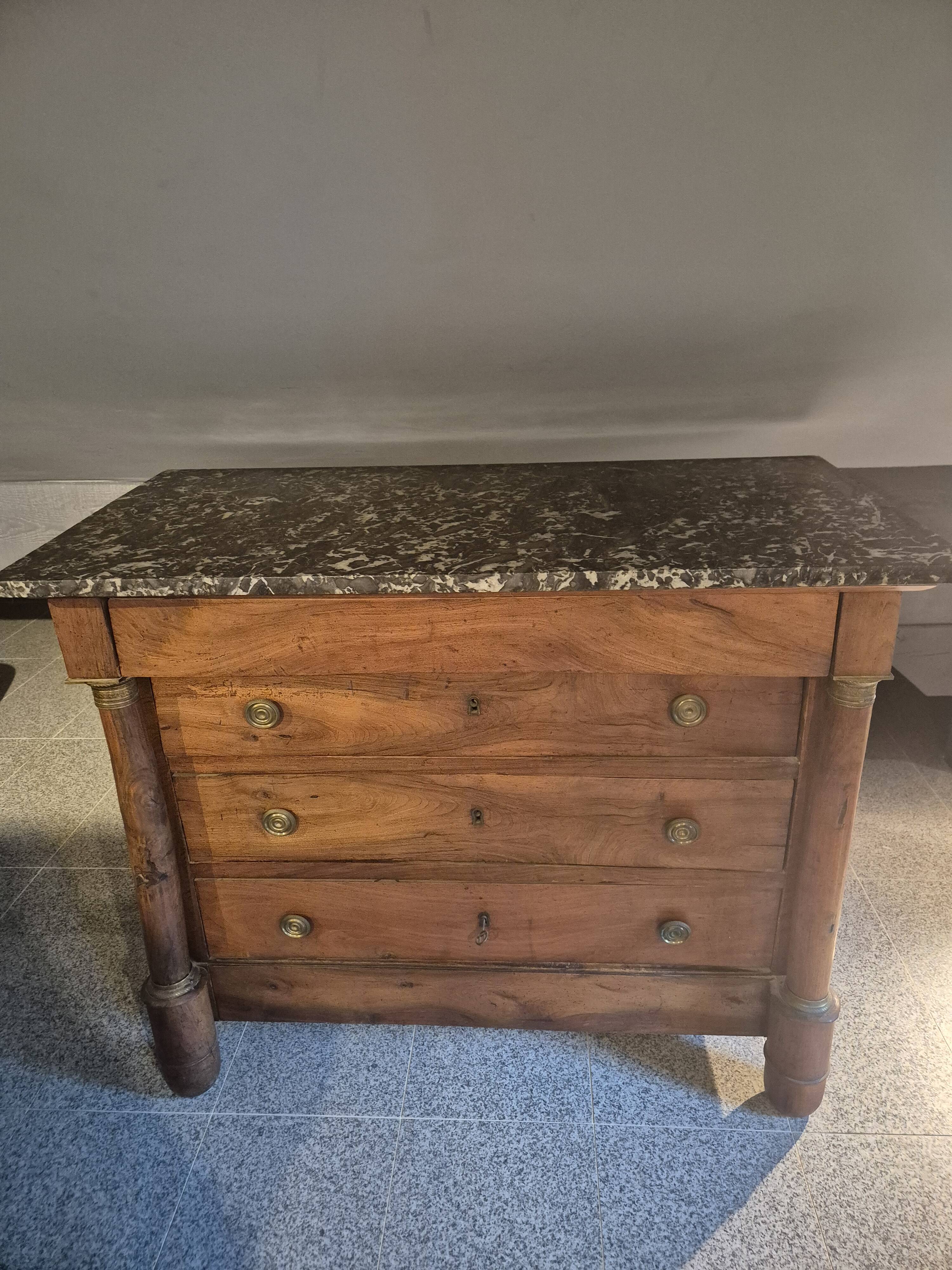 Empire period walnut chest of drawers