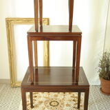 Pull-out tables in mahogany and vintage brass