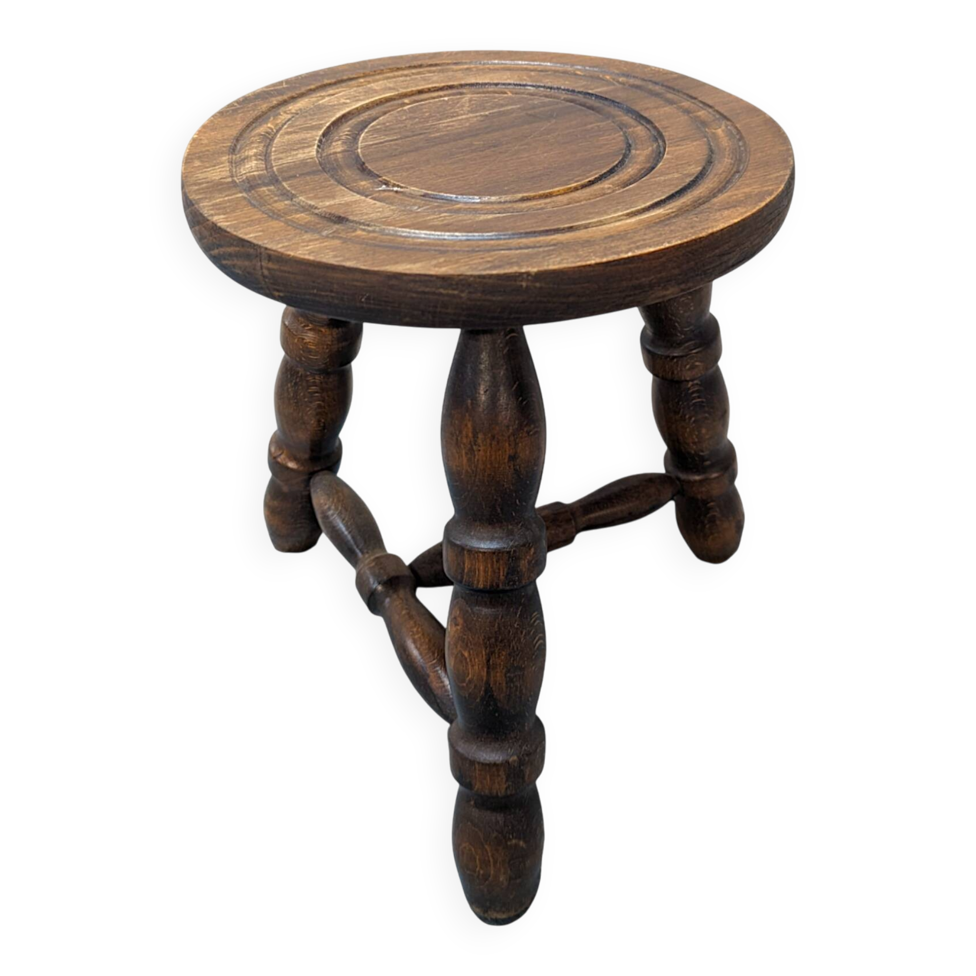 Rustic three-legged oak stool