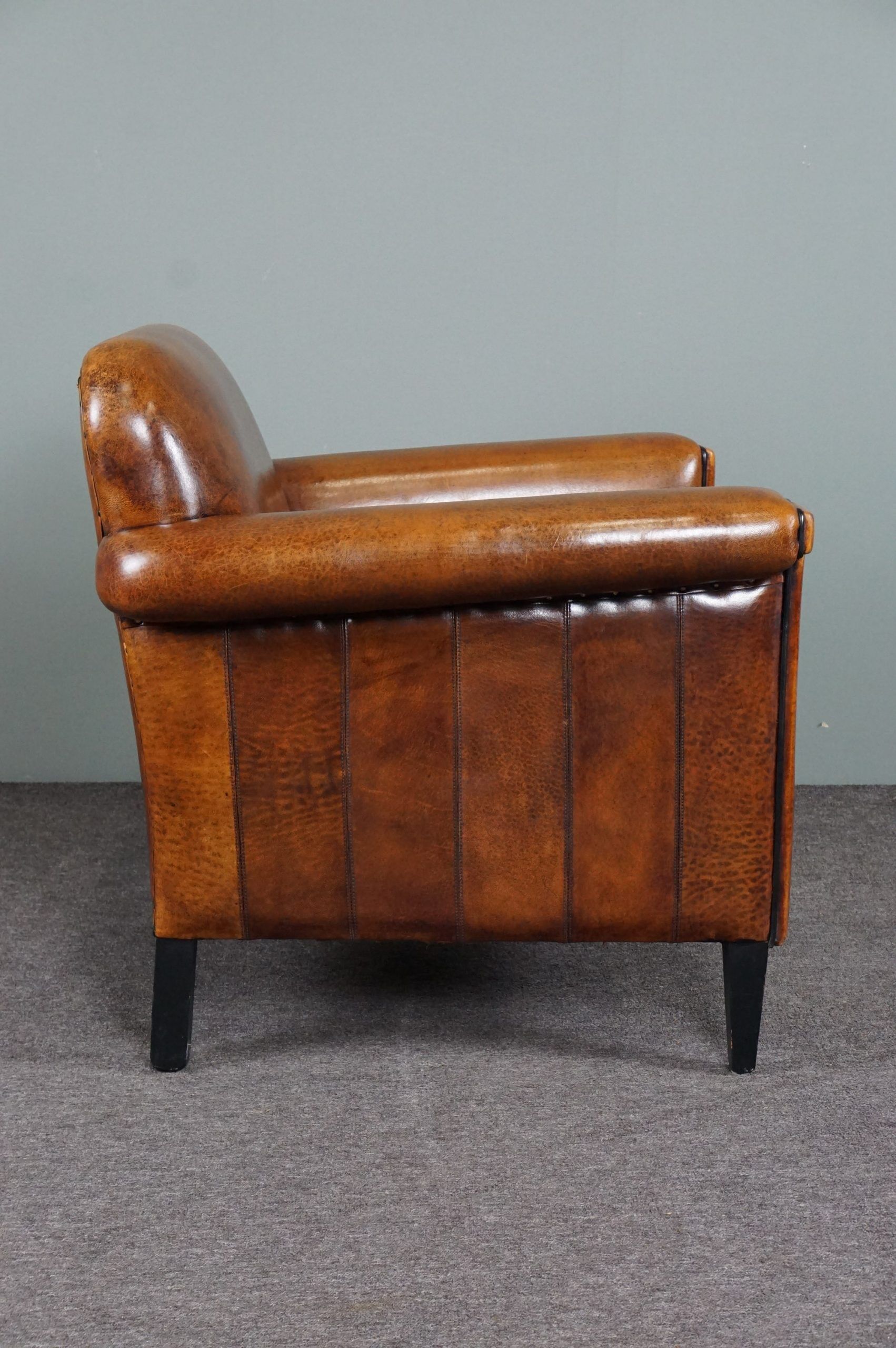 Schapenleren armchair and studio lounge stool