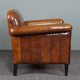 Schapenleren armchair and studio lounge stool