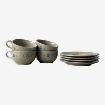 Ceramic cups and saucers with flower decoration