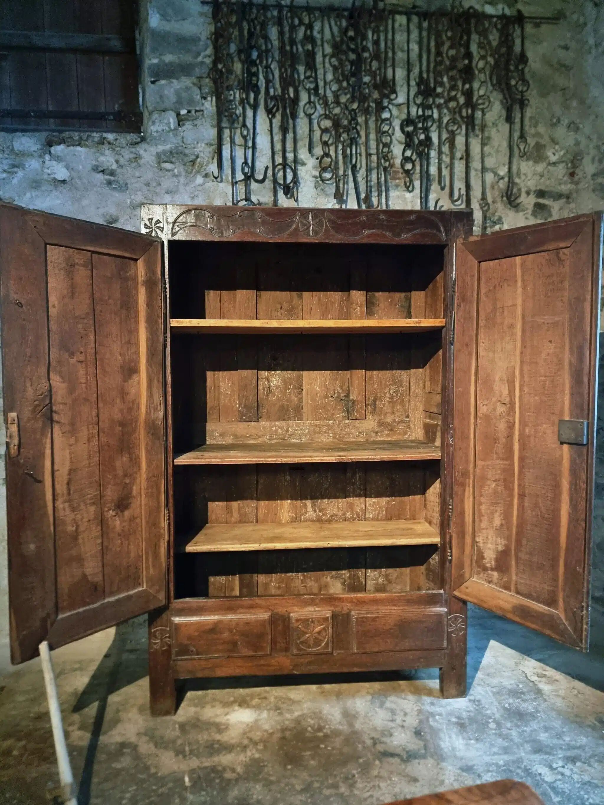 French oak armoire, late 17th - early 18th century, Louis XIV provincial style with hand-carved rosettes