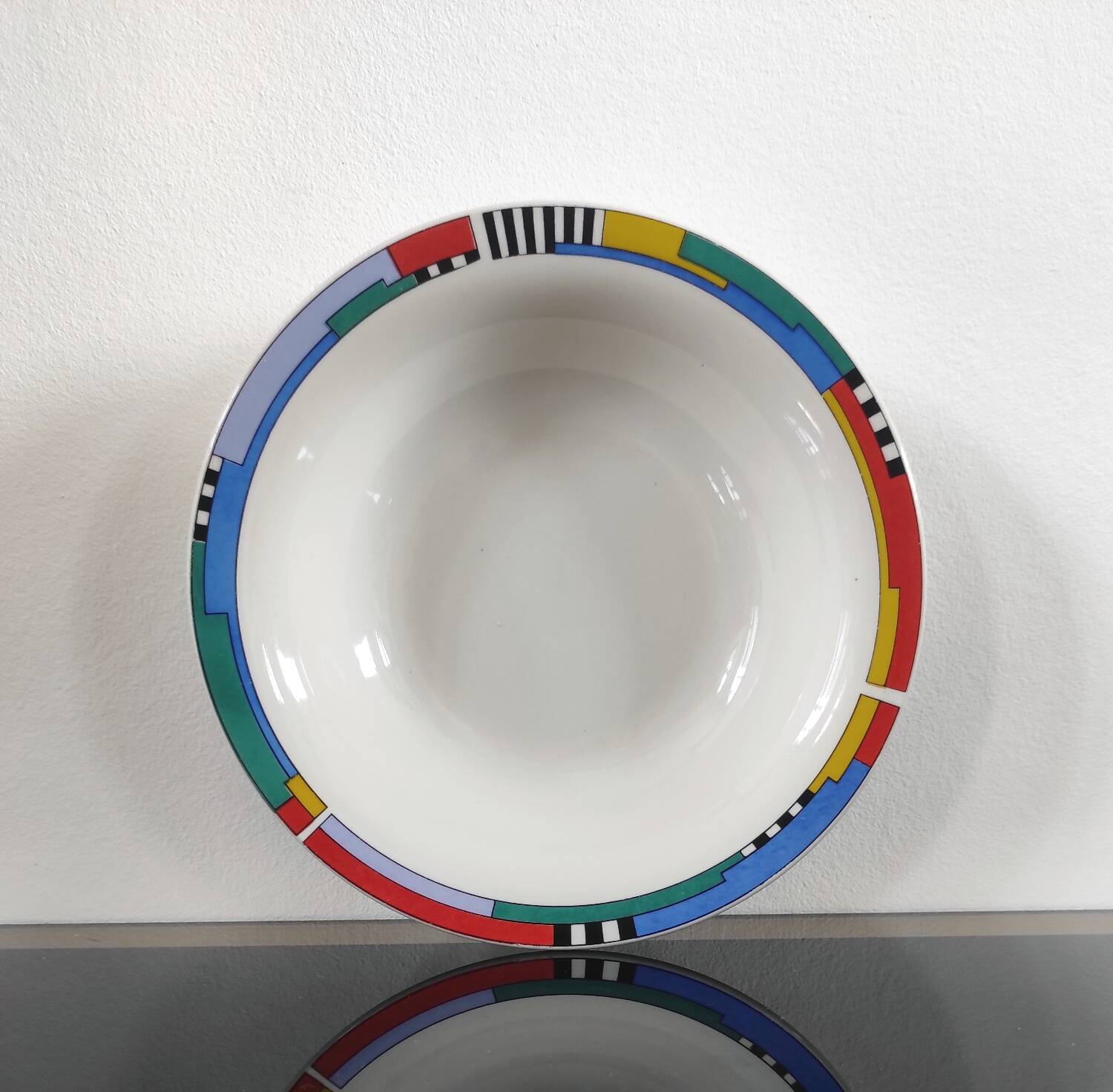 Set of 4 vintage Memphis style deep plates.