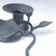 Bougeoir en bronze patiné en forme de fleur