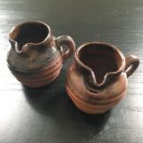 Pair of sandstone pitchers