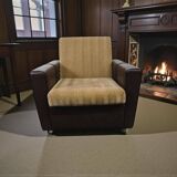 Vintage brown faux leather armchair / retro club chair on wheels