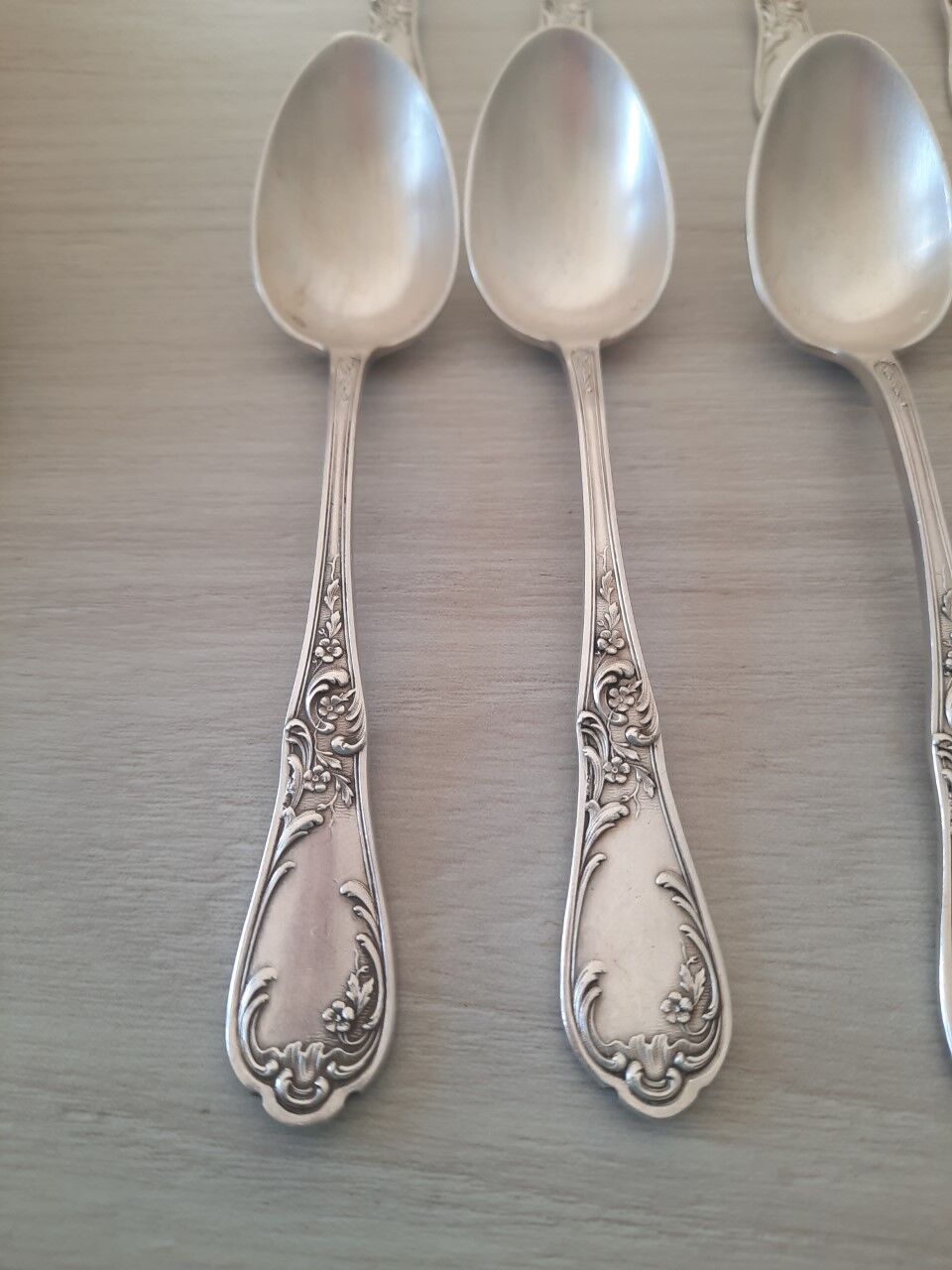 Box of 12 small old spoons in silver metal