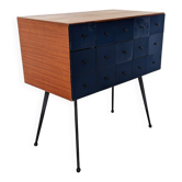 Vintage workshop furniture with 15 blue drawers.