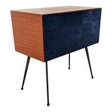 Vintage workshop furniture with 15 blue drawers.