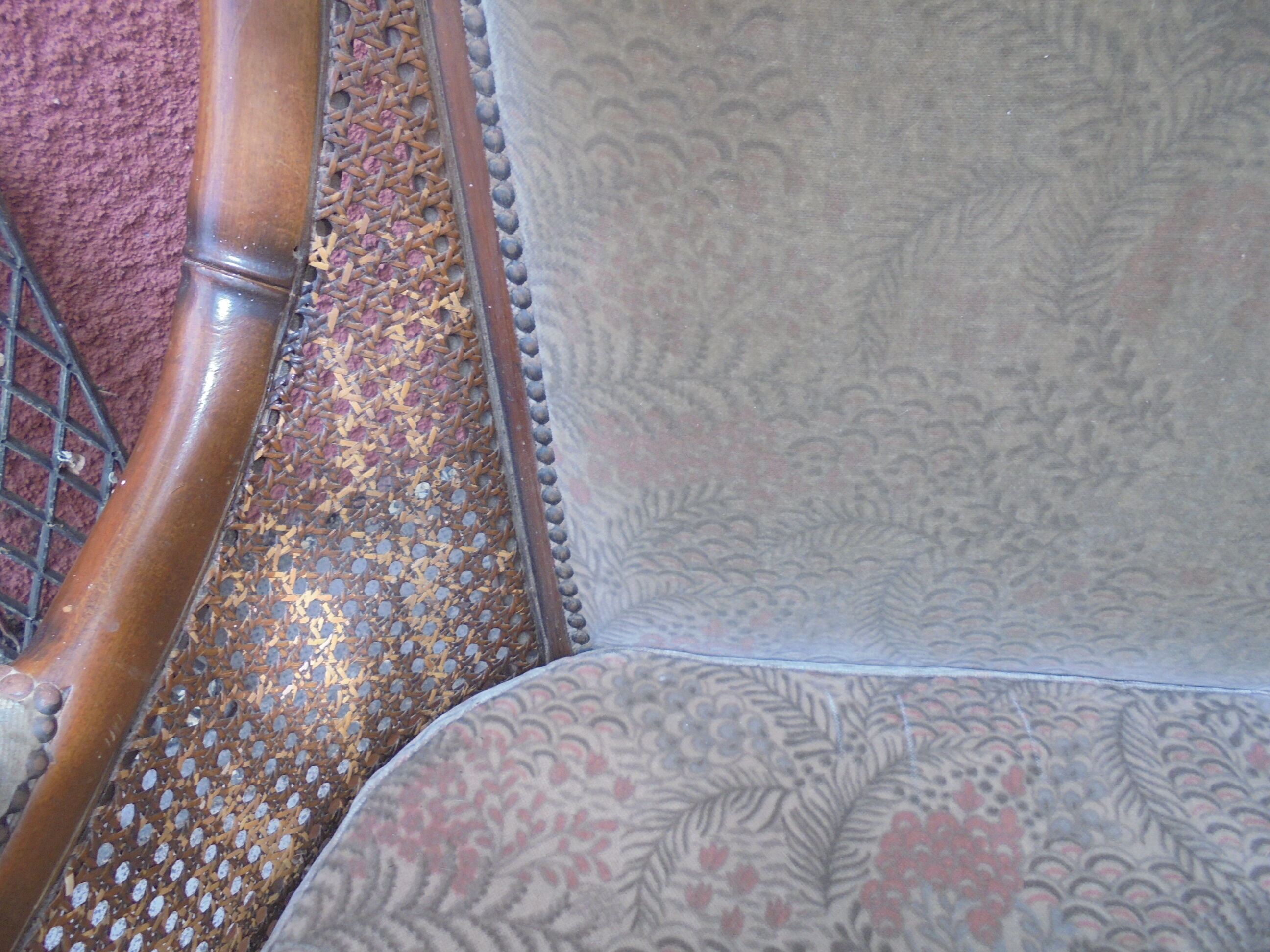 Rattan cane sofa and armchair circa 1970