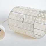 Suspension in mother-of-pearl buttons