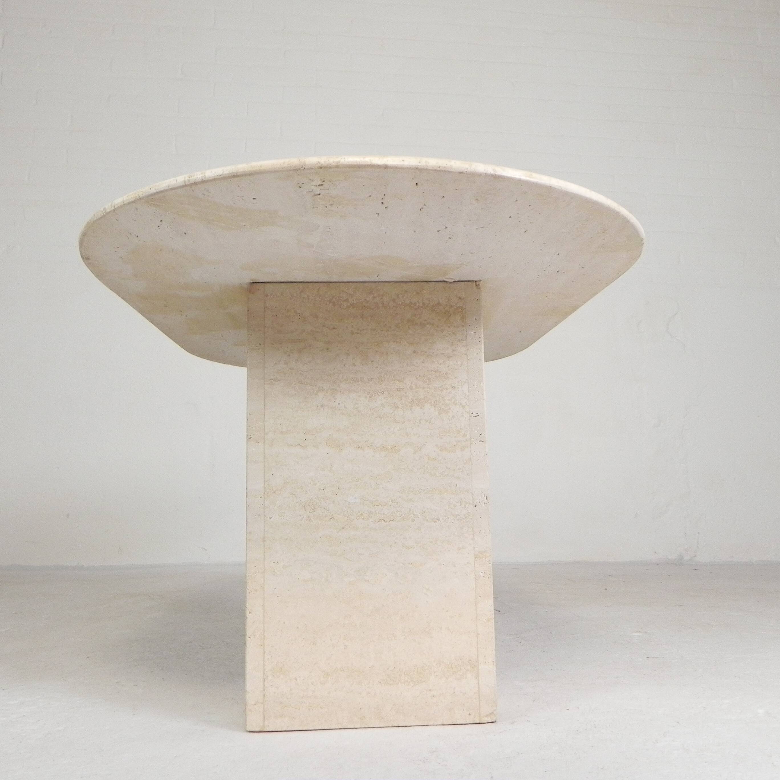 Mid-Century travertine coffee table with an oval top, 1970s.