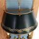 Pair of bronze and sheet metal hot water bottle wall lights
