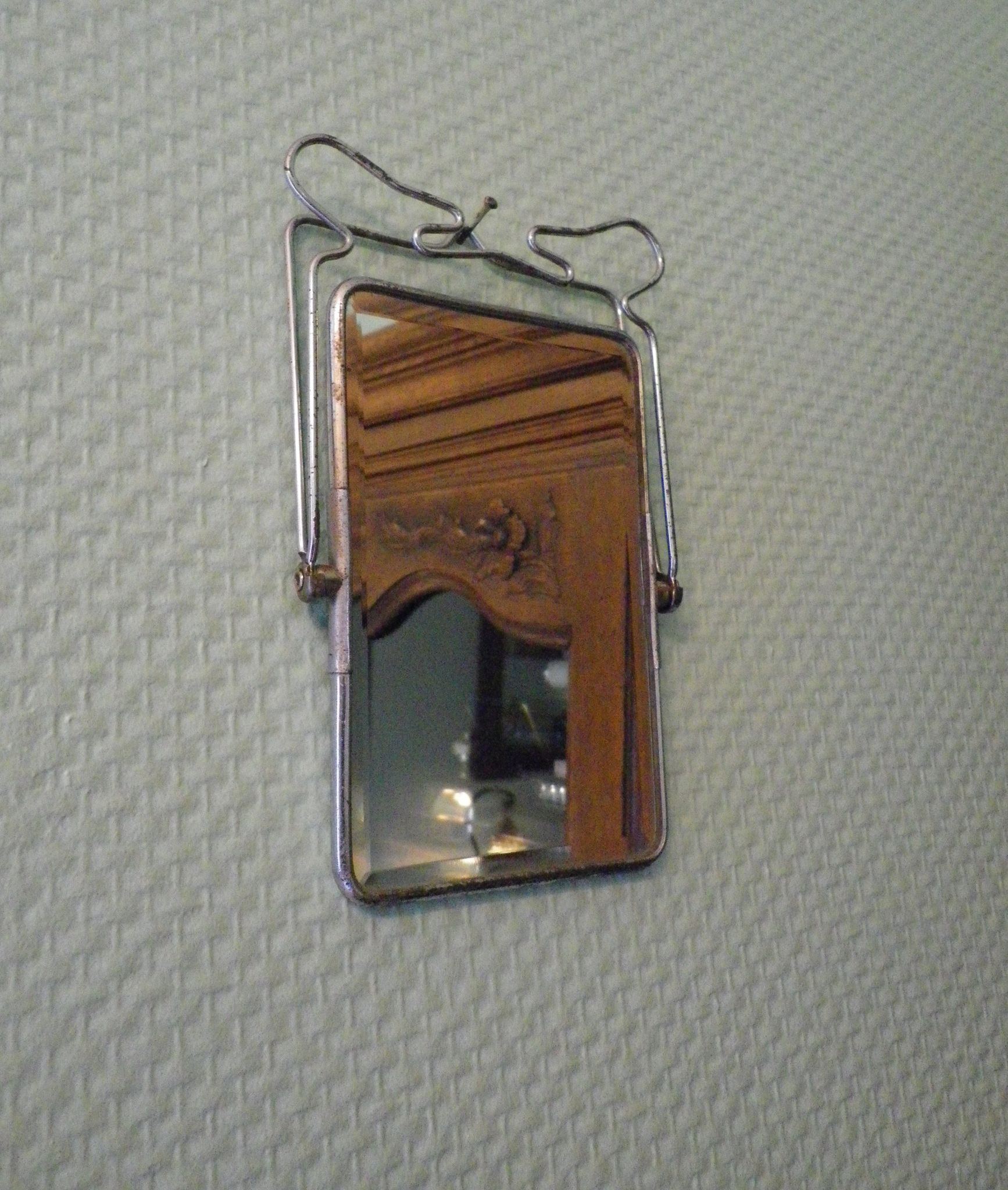 Two-foot barber mirror, suspension mode, beveled, chrome metal - 70s -