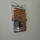 Two-foot barber mirror, suspension mode, beveled, chrome metal - 70s -