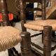 Pair of solid wooden chairs and mulched seat