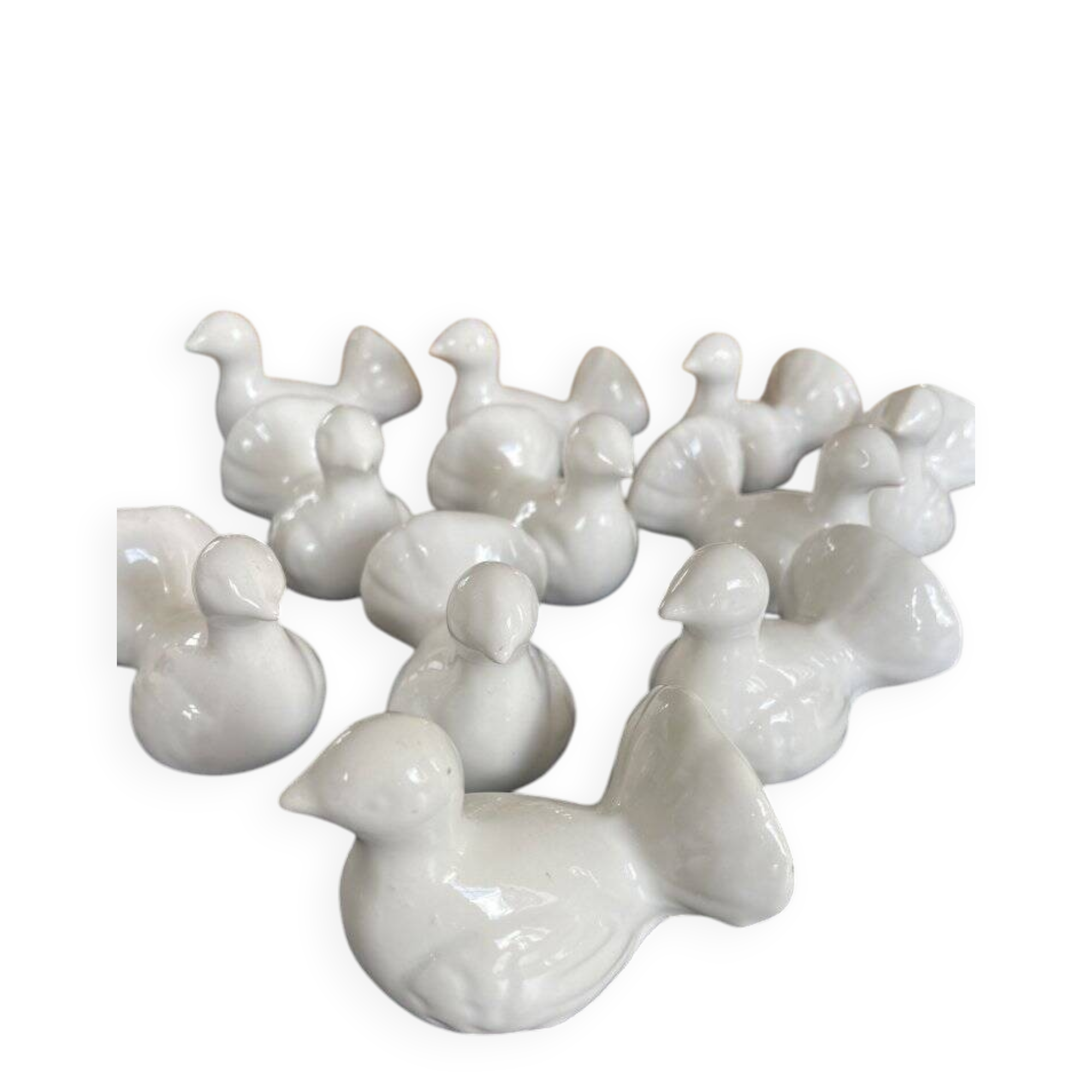 11 zoomorphic ceramic knife rests in white
