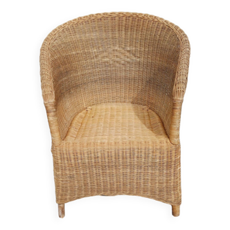 Old rattan and wicker armchair