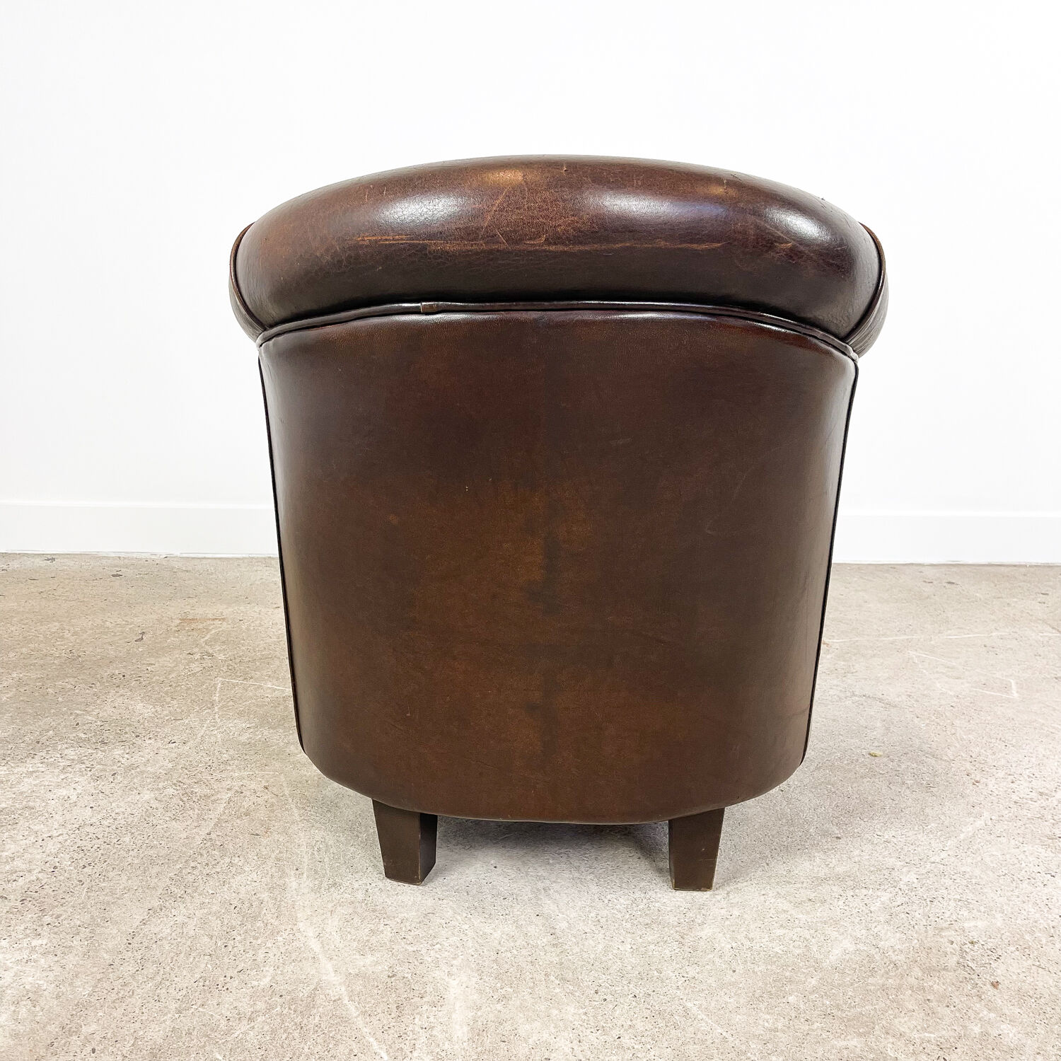 Vintage dark brown sheep leather clubchair rijsbergen