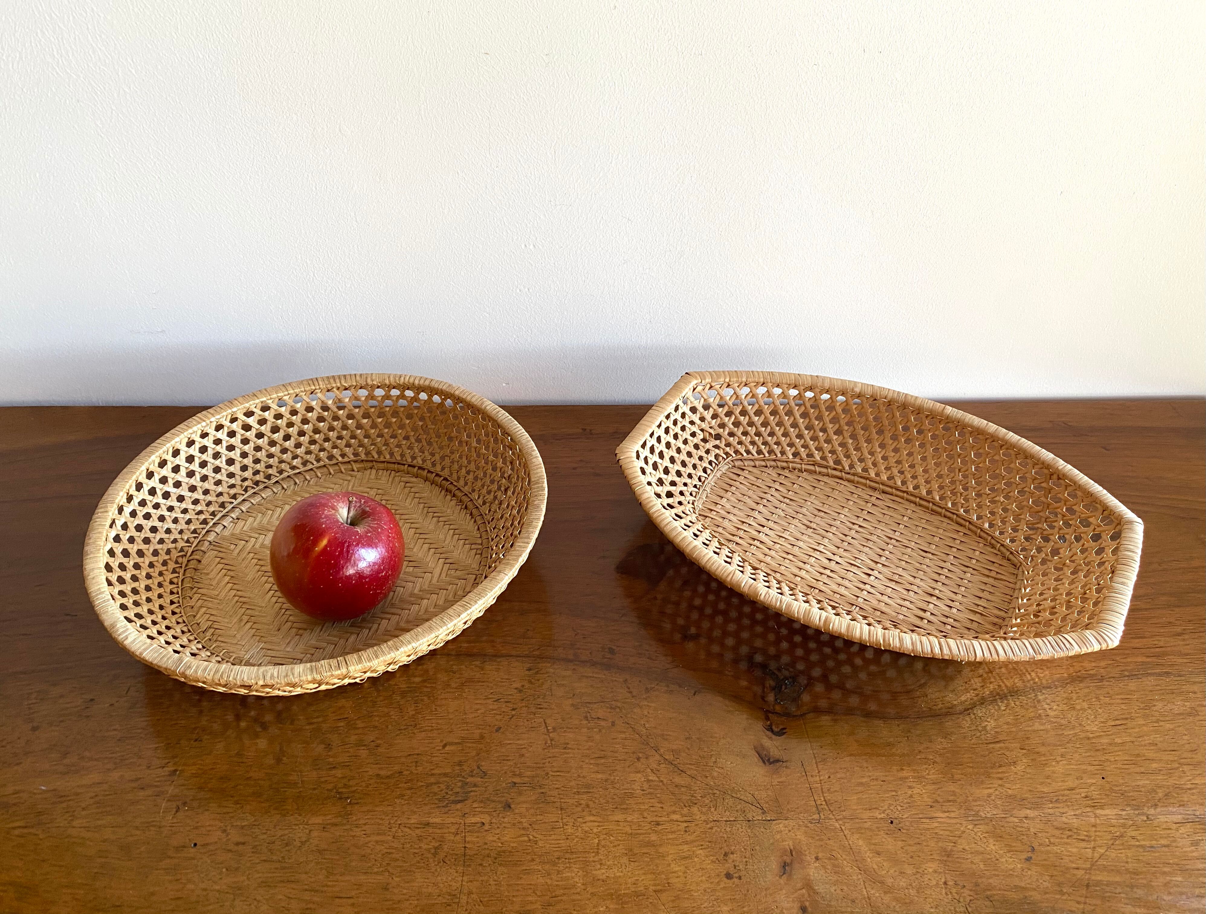 Pair of vintage braided rattan baskets