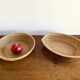 Pair of vintage braided rattan baskets