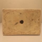 Bust of woman in off-white biscuit