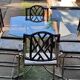 Vintage 1970s set in gilded brass, glass table and 6 brown and straw yellow chairs.