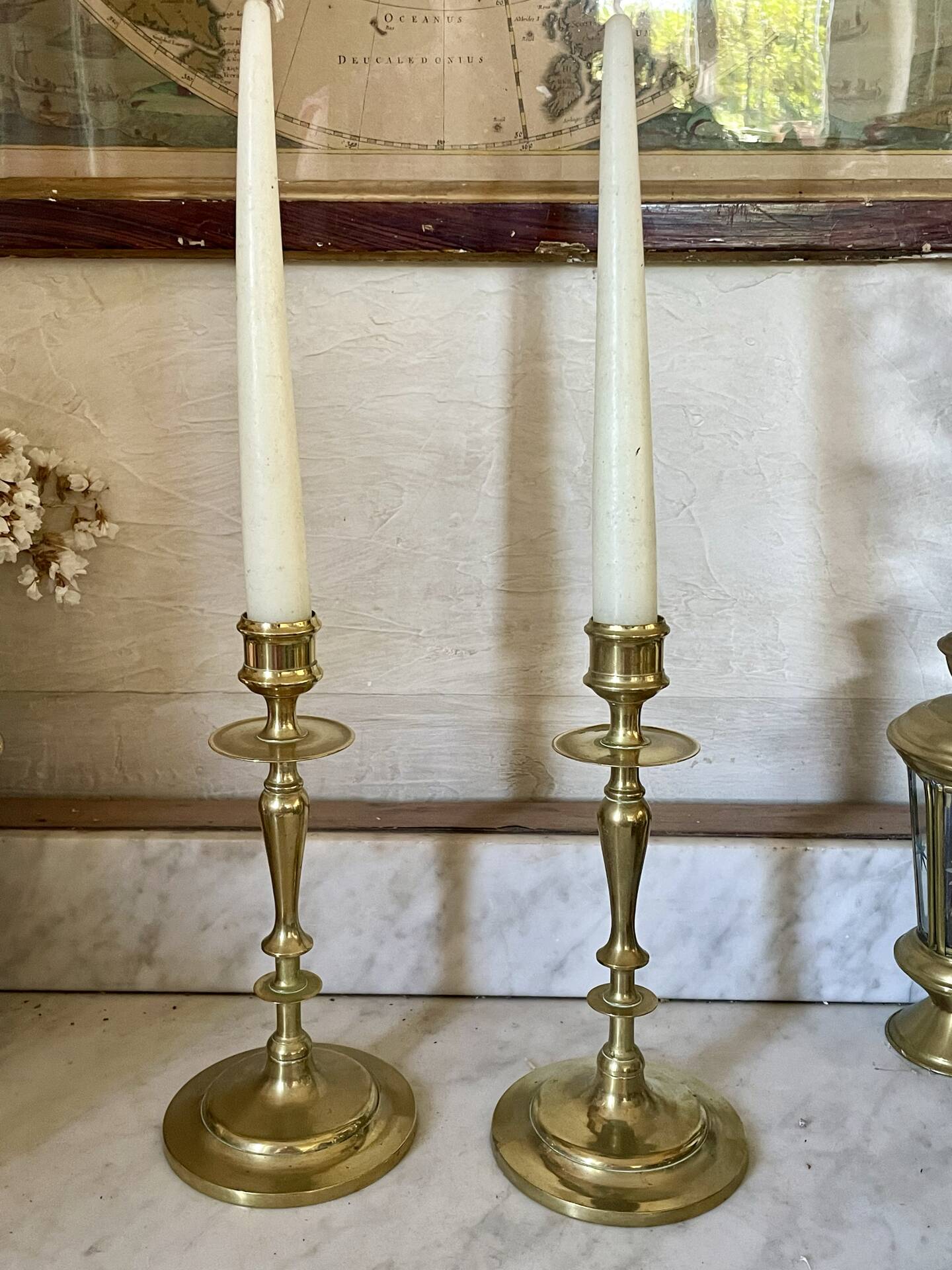 Old pair of turned brass candlesticks