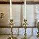 Old pair of turned brass candlesticks