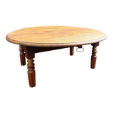 Round oak coffee table with drop leaves and turned legs
