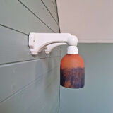 Pair of Art Deco wall sconces in multicoloured porcelain and frosted glass.