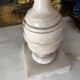 Antique lamp with a marble base.