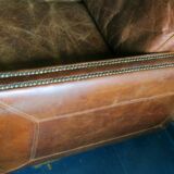 Patinated brown stitched leather 2 seater sofa with brass studs