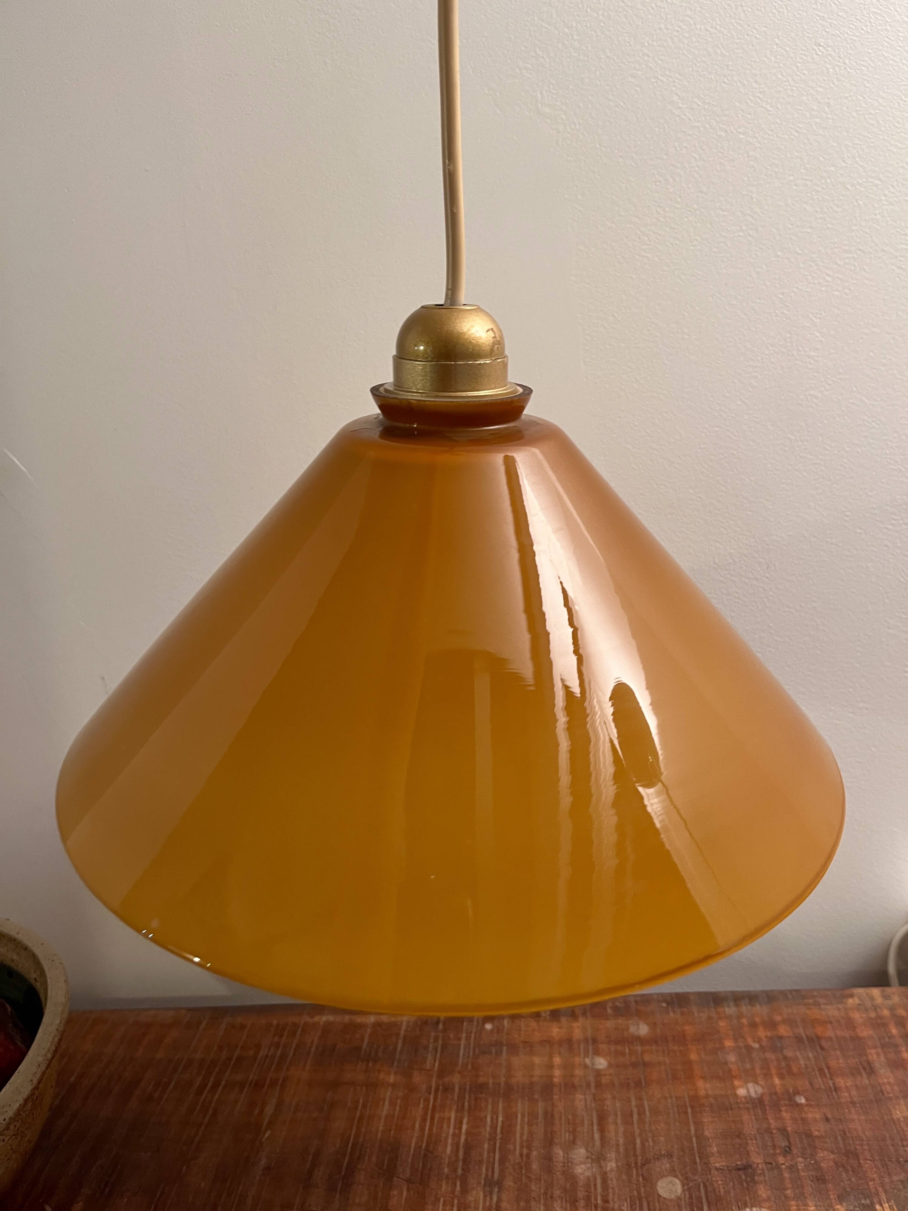 Caramel-colored opaline glass pendant light