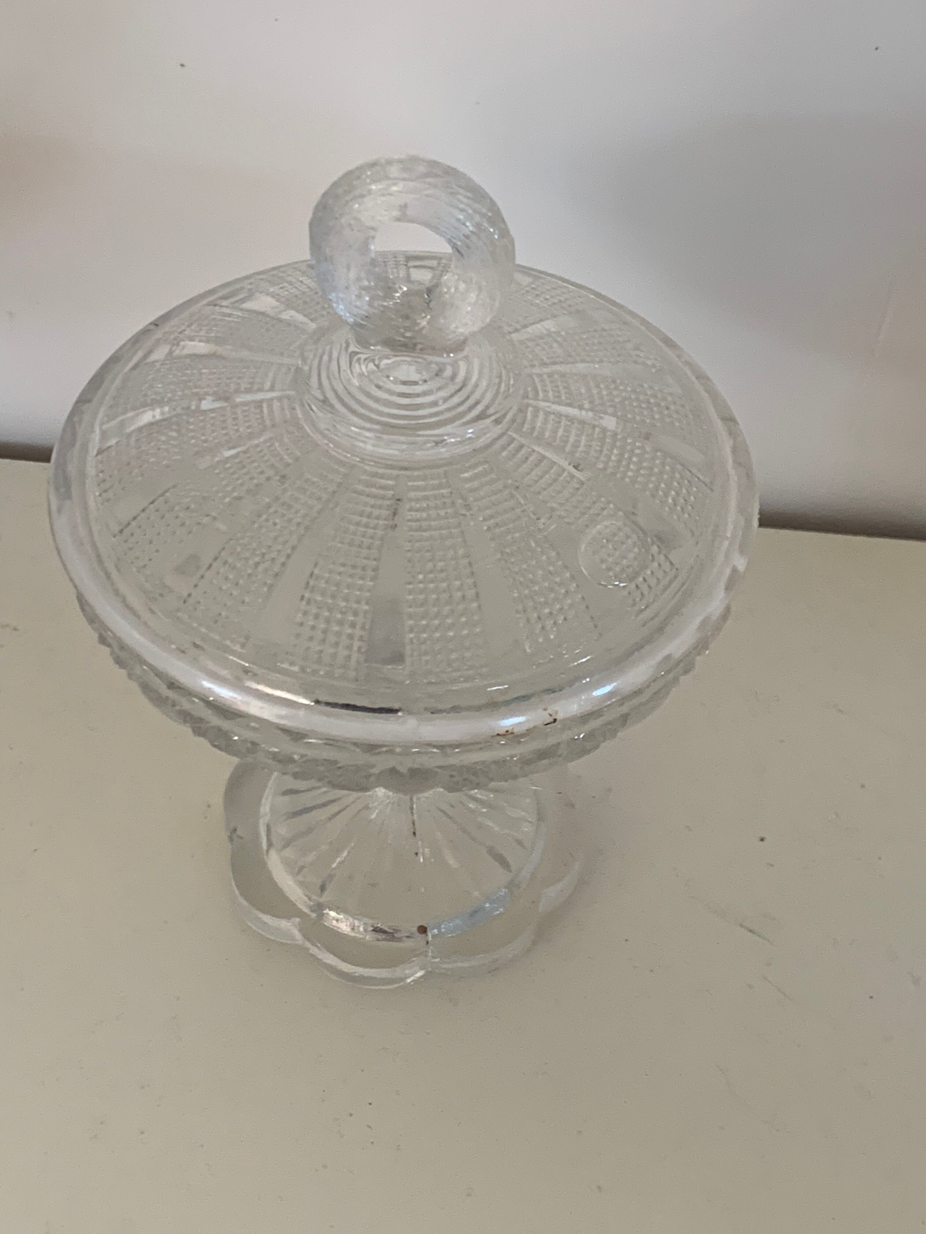 Two dredged cups in transparent glass geometric patterns in old relief