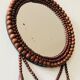 Miroir mural vintage en perles de bois