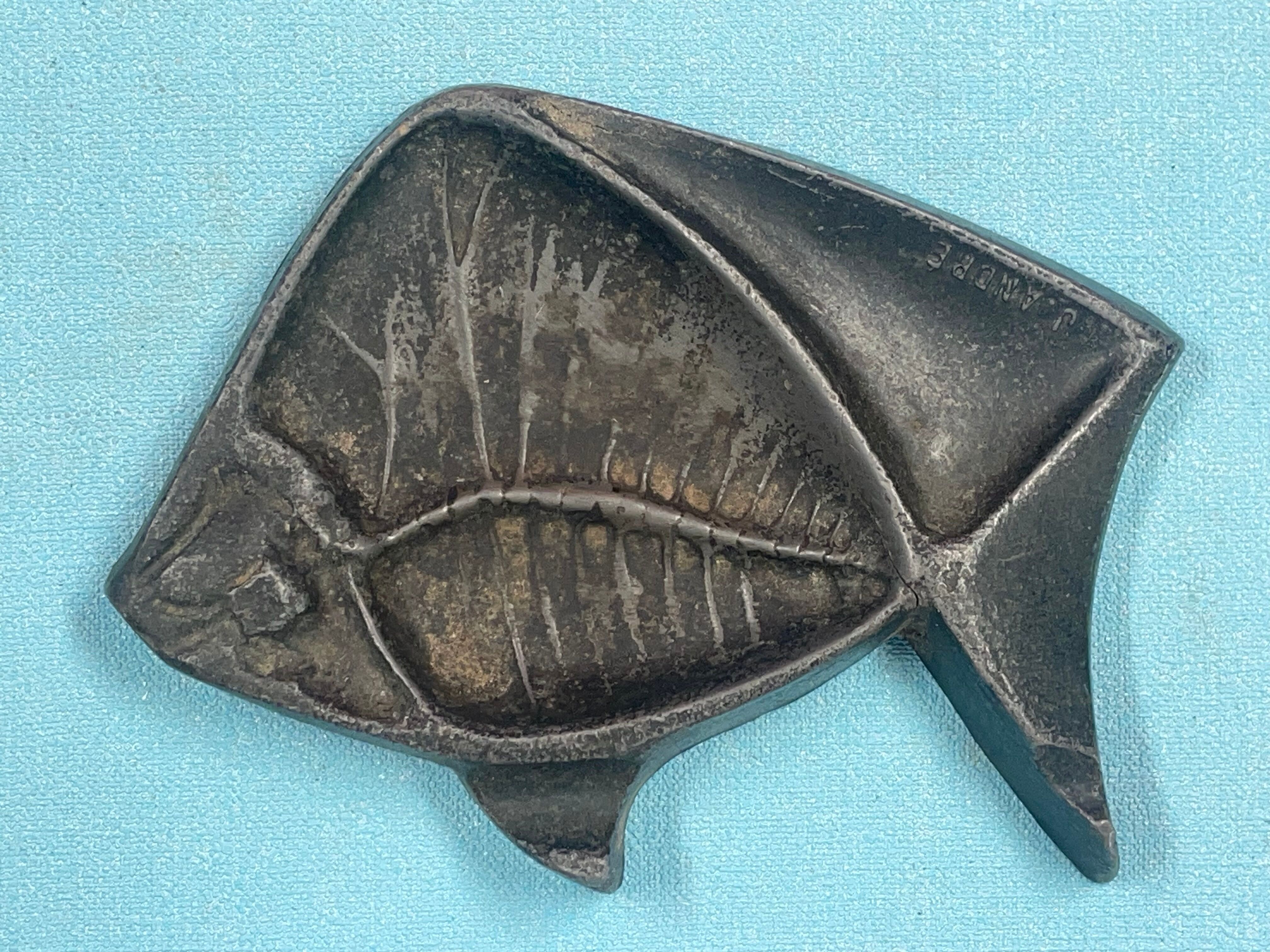 Empty pocket, art deco fish advertising ashtray signed J. André, regulates
