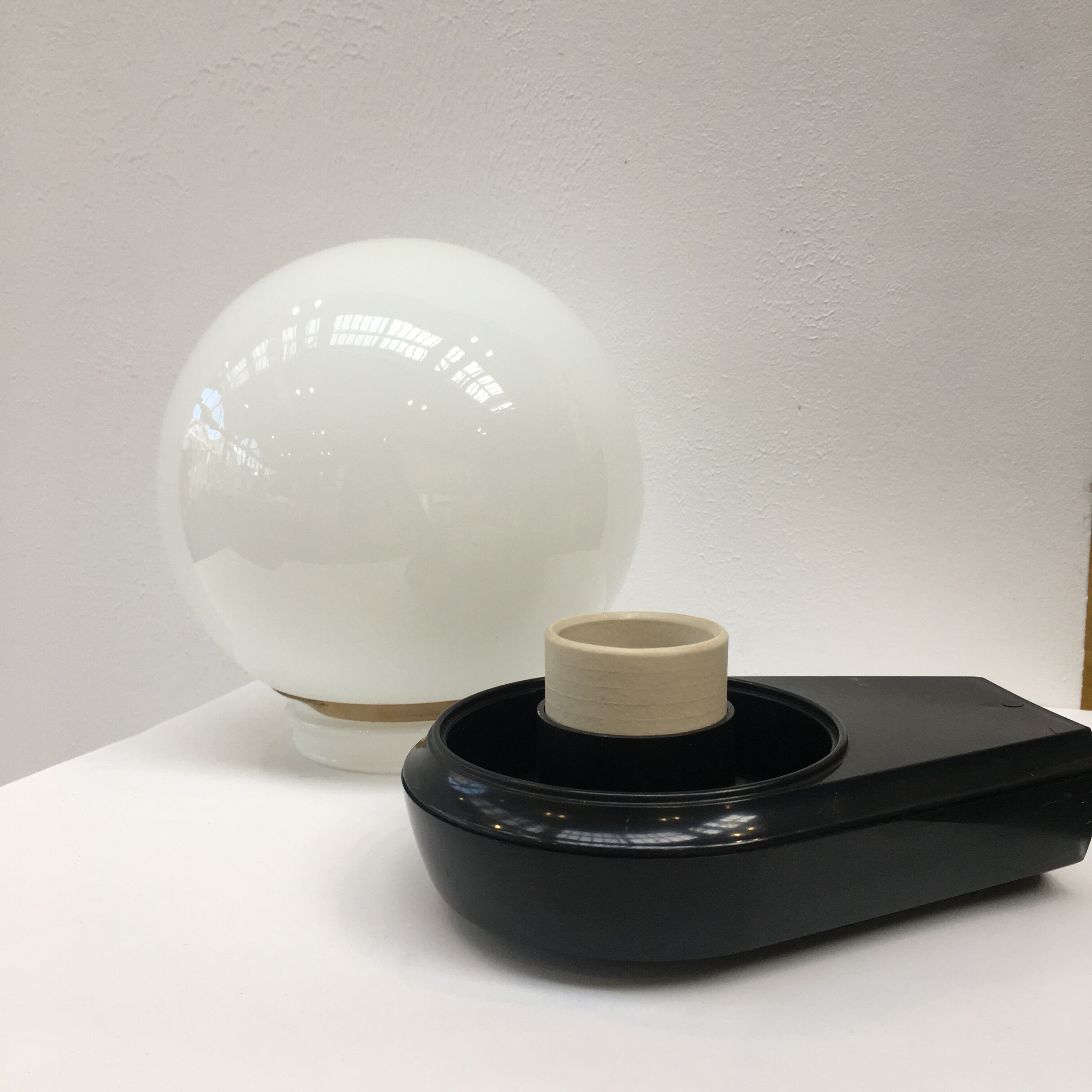 Vintage wall lamp black plastic base and opaline globe