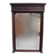 Imposing beveled mirror with wooden frame