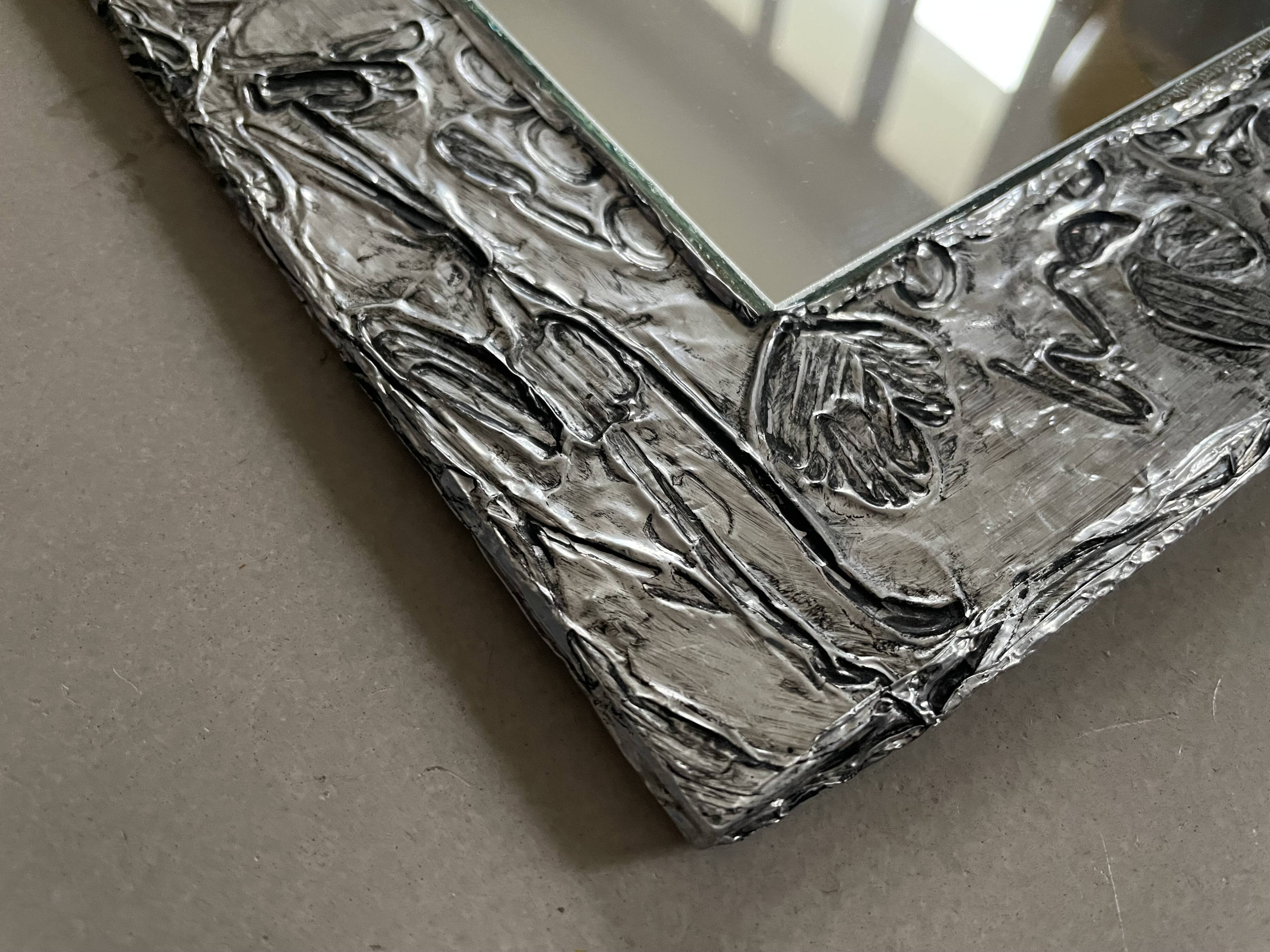 Vintage stamped mirror