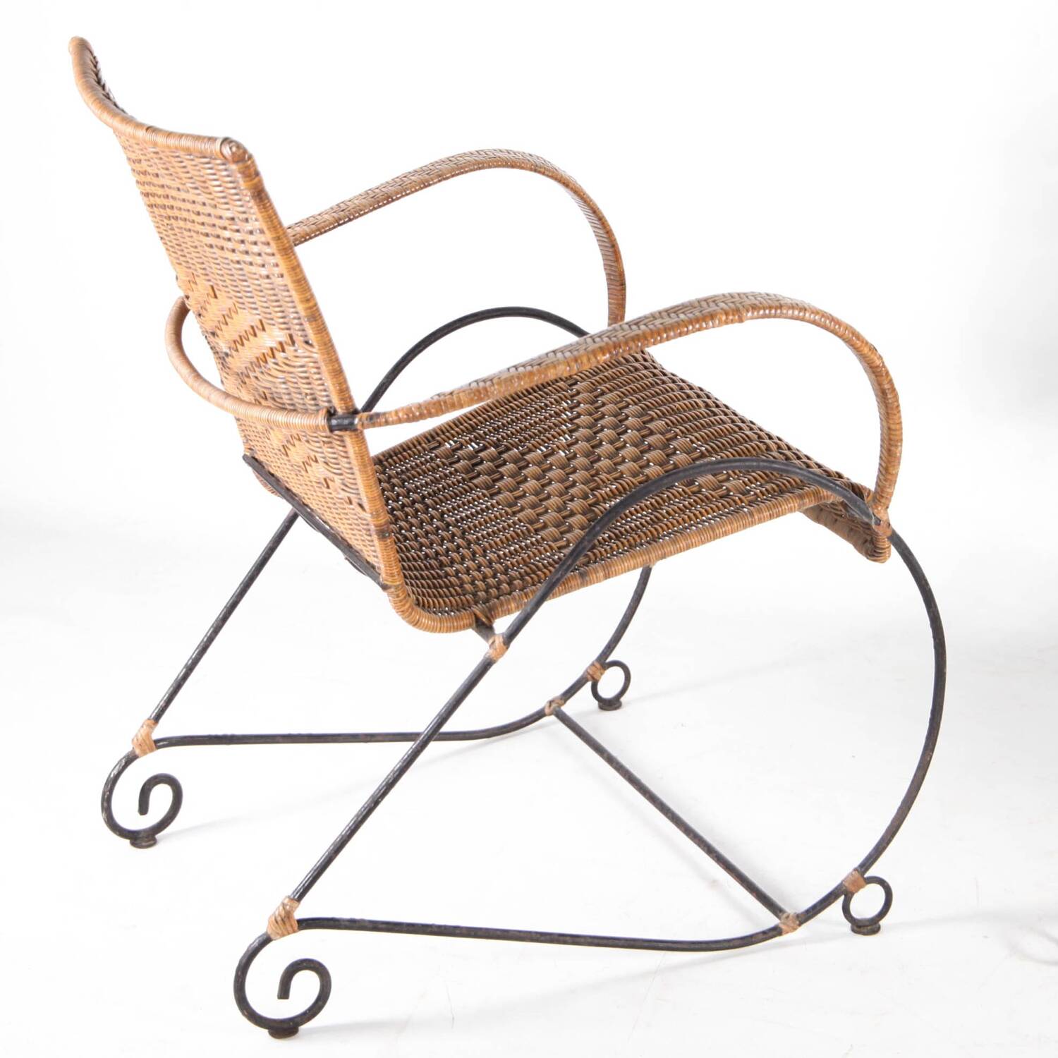 Pair of rattan and iron armchairs