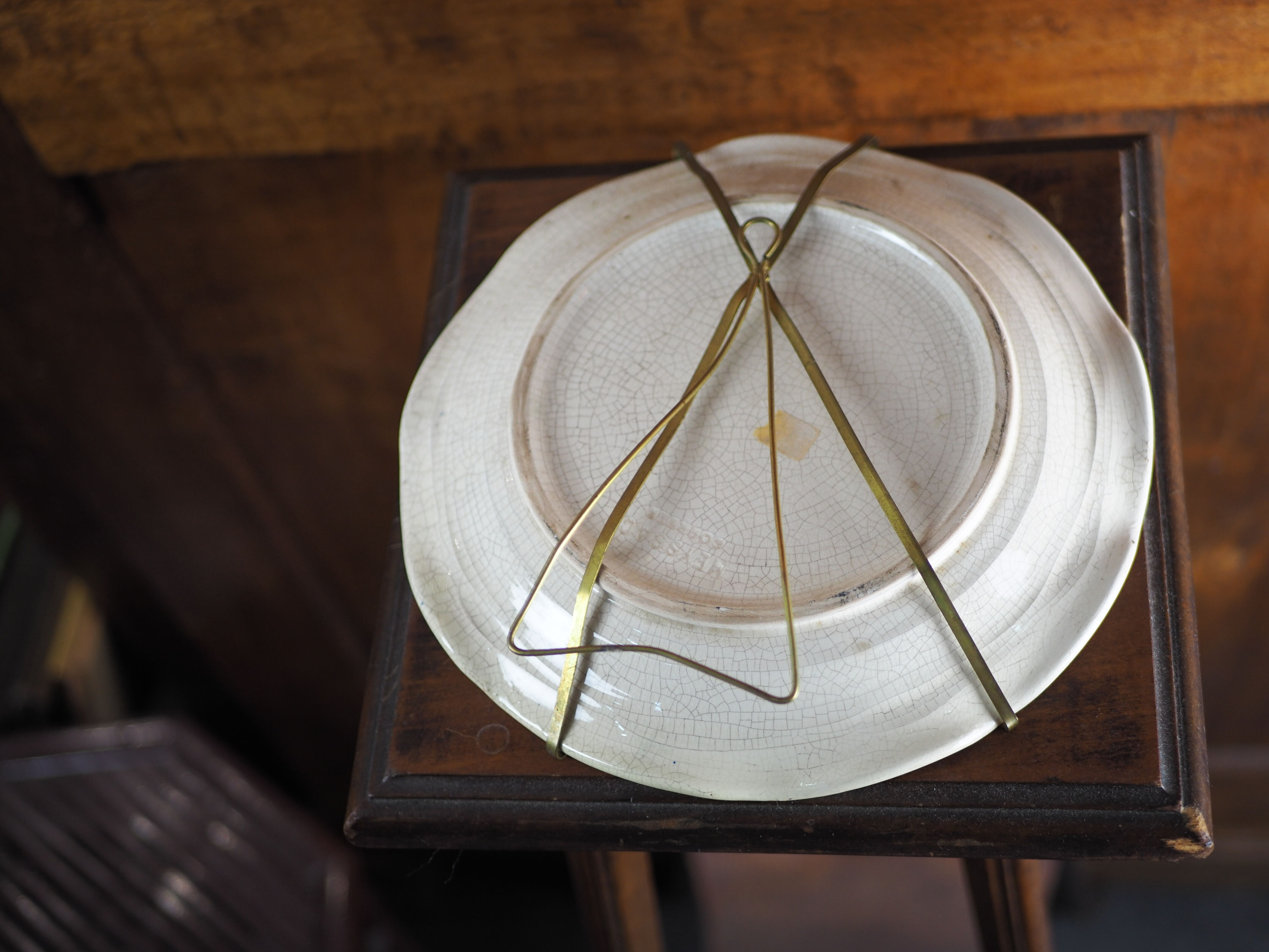 Meyssac plate decorated with flowers on cracked background early twentieth century and its support