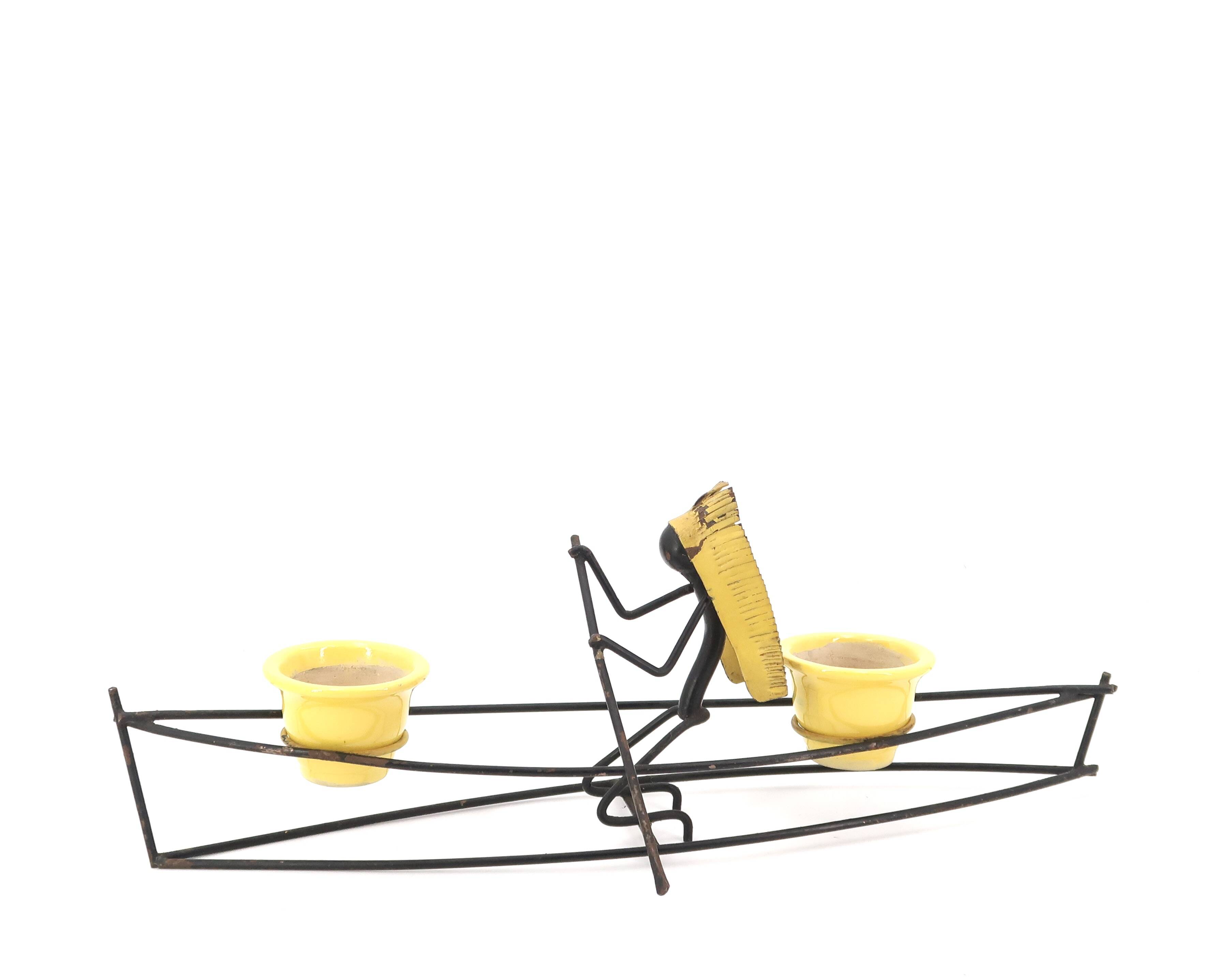 Ceramic flower pot in dugout with Indian, 1950s