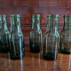 Lot de 5 bouteilles anciennes en verre vert olive