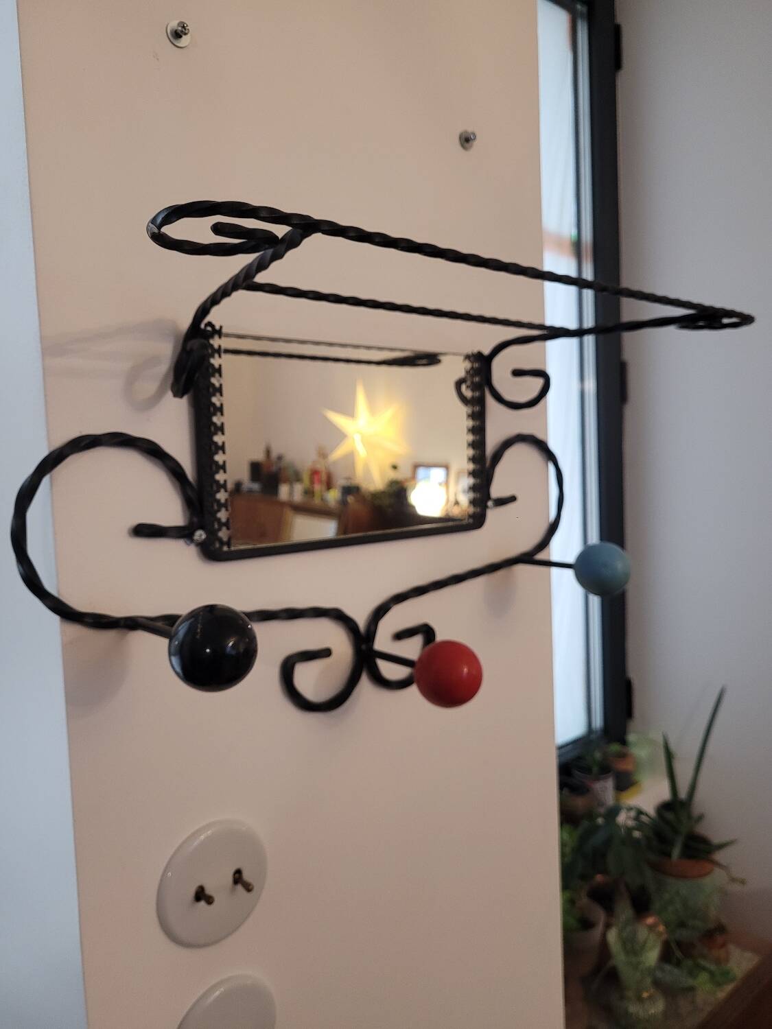 Wrought iron coat rack