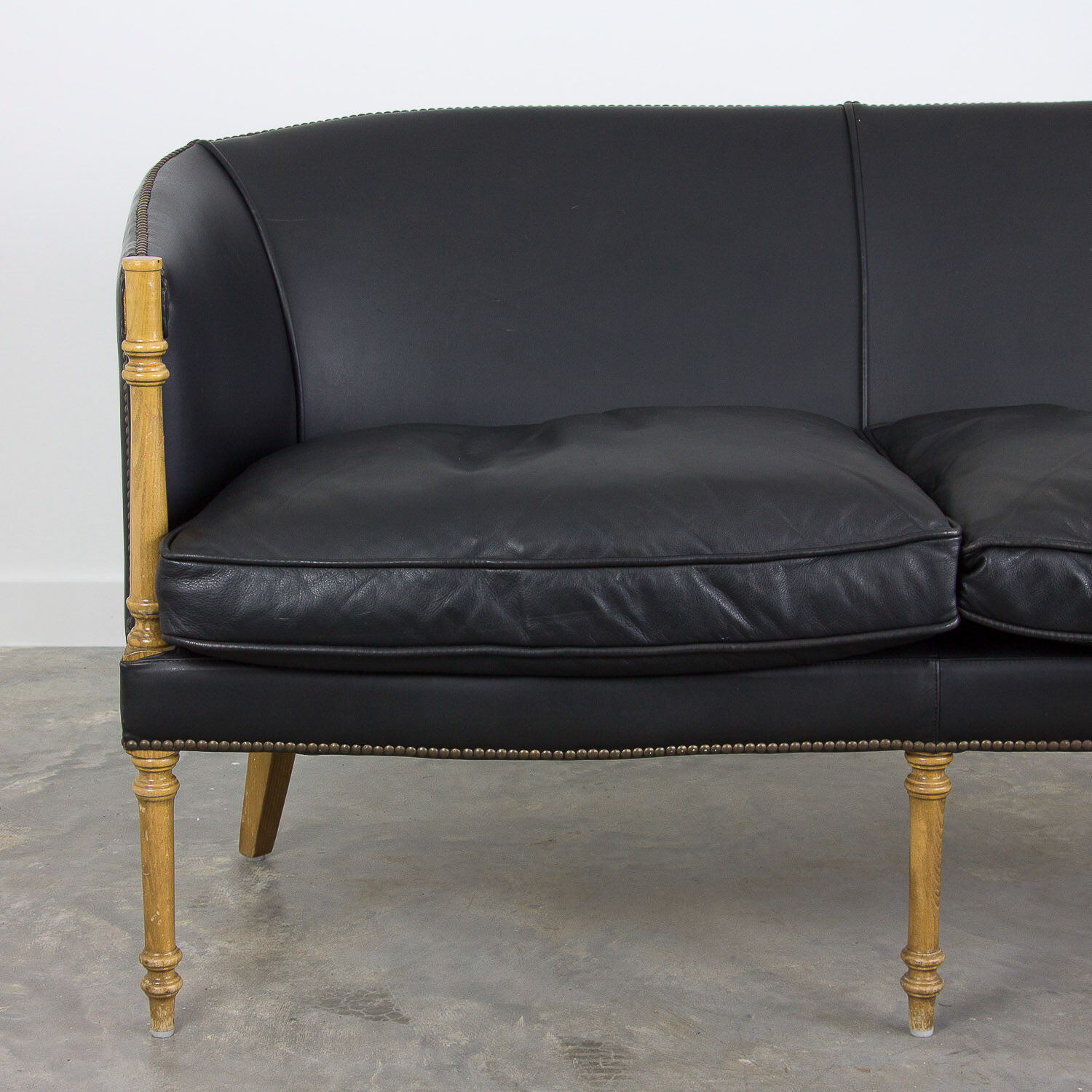 Black leather club sofa