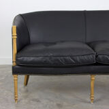 Black leather club sofa