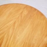 Vintage extendable round wooden dining table