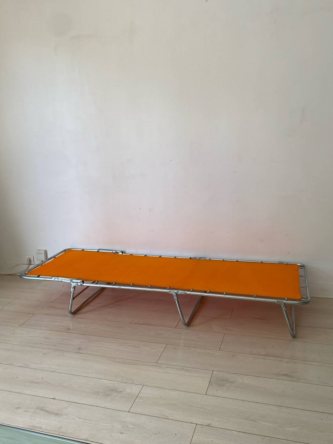 Orange and metal deckchair 1970